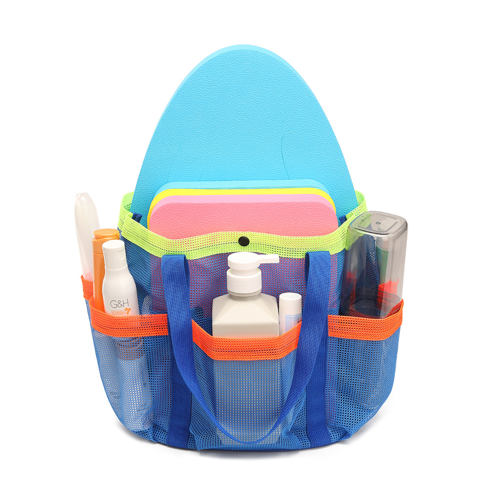 Family enjoying an outdoor picnic and poolside gathering utilizing the versatile large capacity mesh beach bag for organized storage